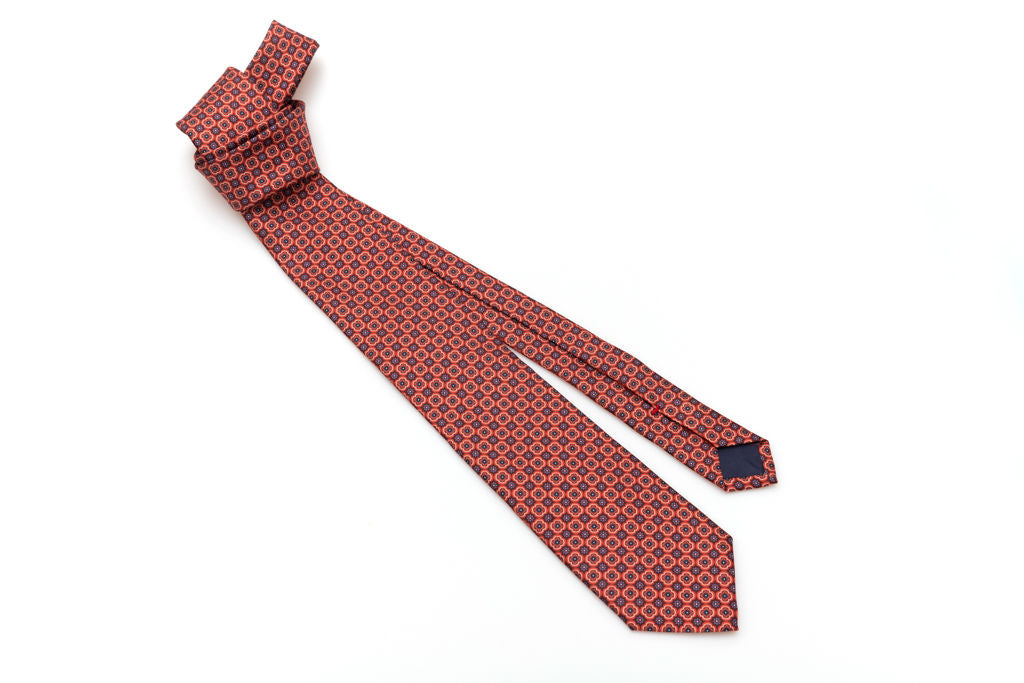 Orange tie with micro pattern in pure silk