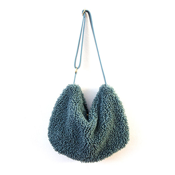 BOUCLE' - leather and eco-fur bag in aviation