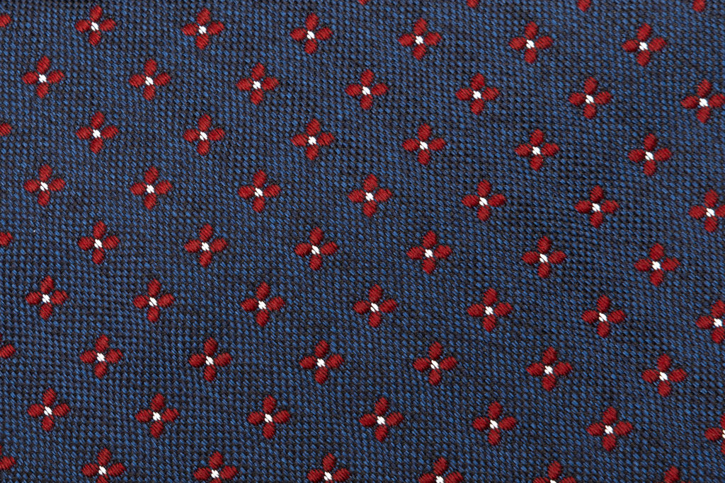 Blue base tie with floral geometry pure silk