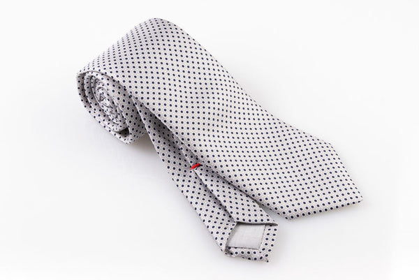 Ice grey tie with blue and white polka dots