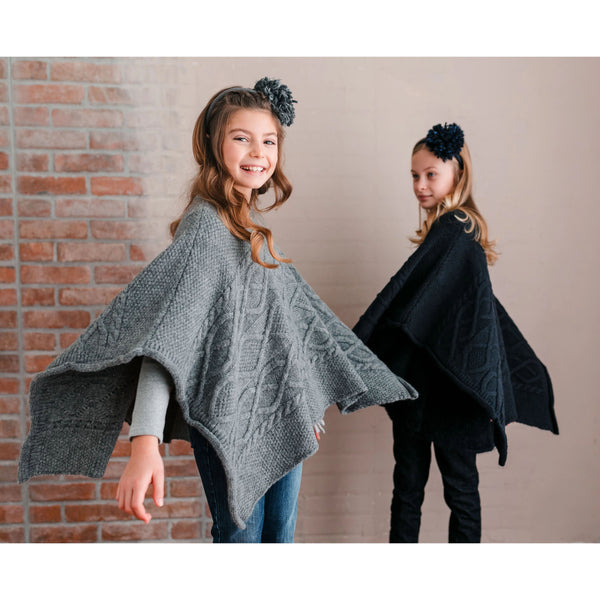 PONCHO IN MAGLIA FANTASIA A TRECCE