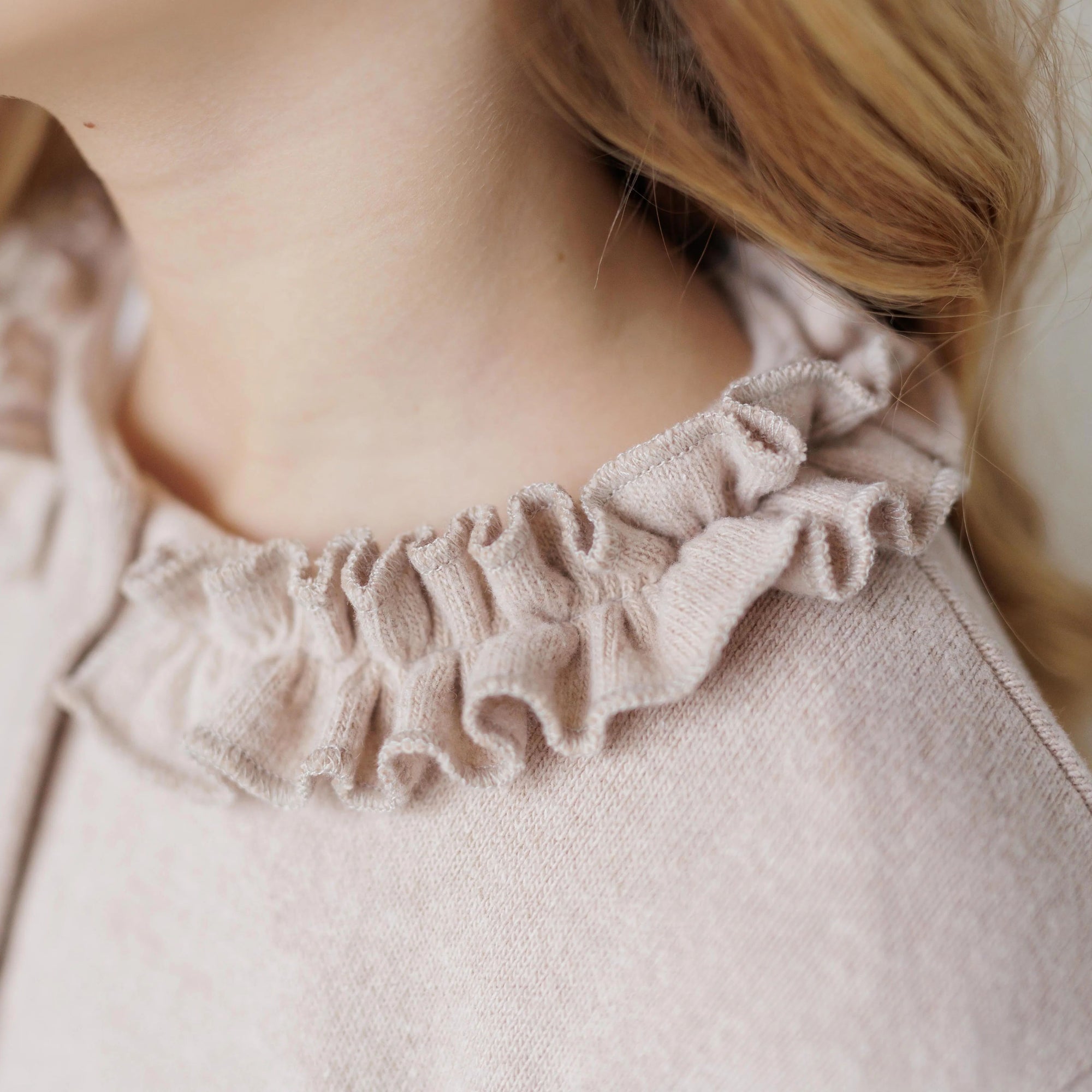 CARDIGAN WITH RUFFLES ON THE COLLAR