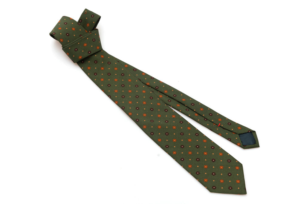 Cravatta verde con geometria in pura seta