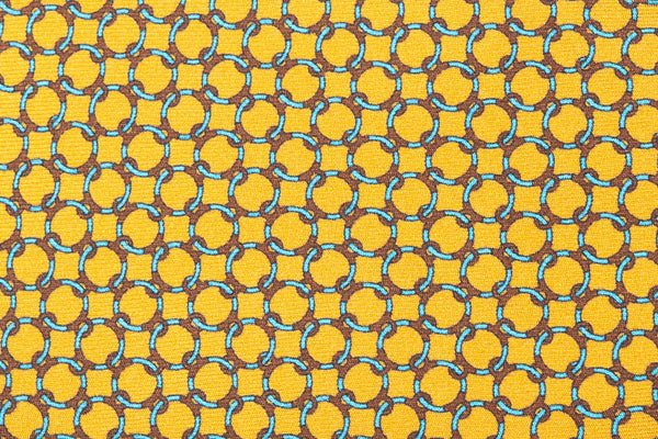 Cravatta giallo ocra con fantasia geometrica 100% seta