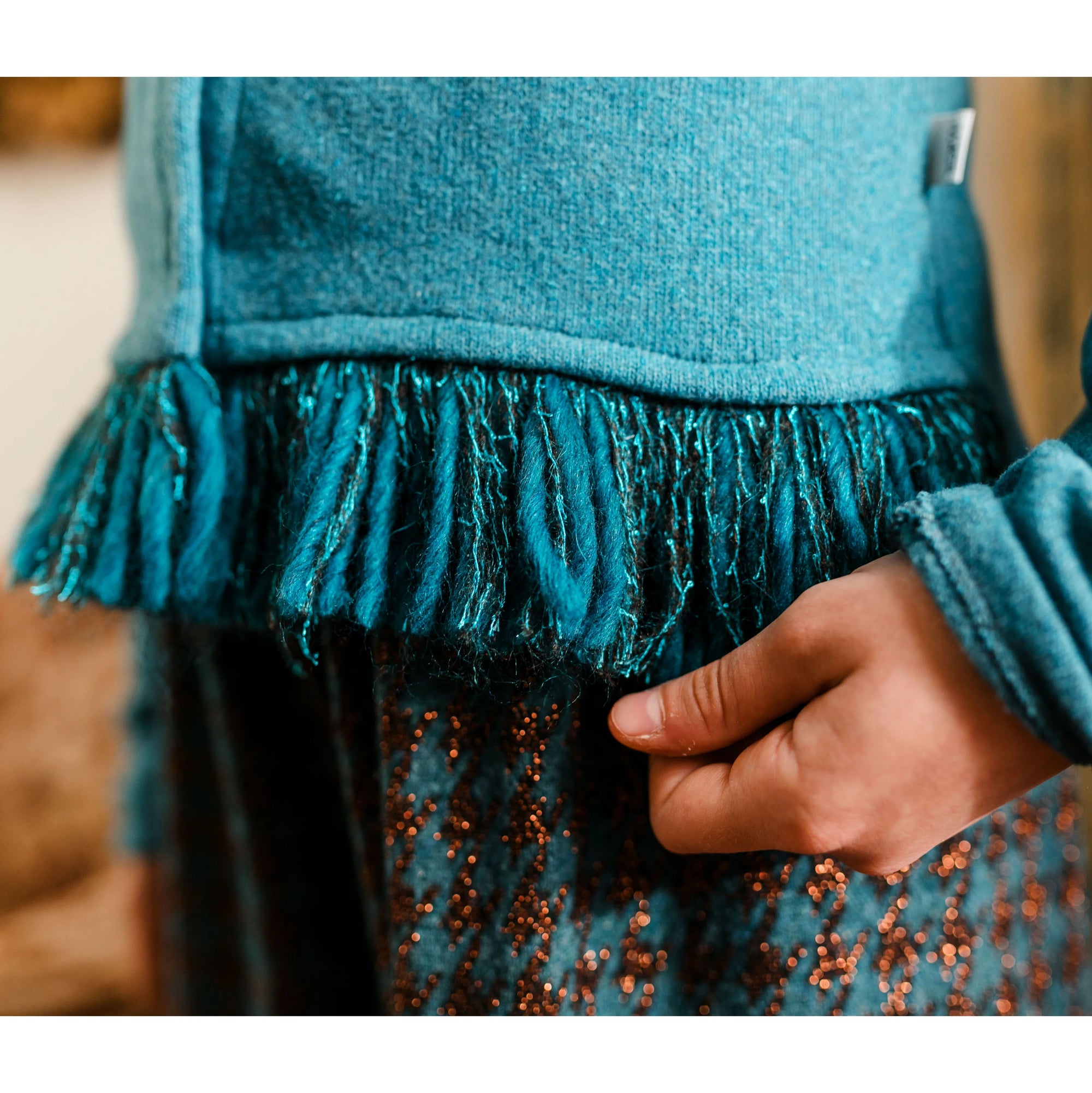 CARDIGAN FRINGE DETAIL