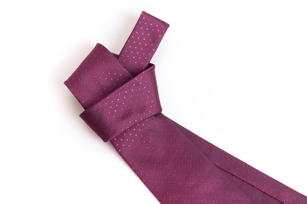 Dark pink tie with micro polka dots in pure silk