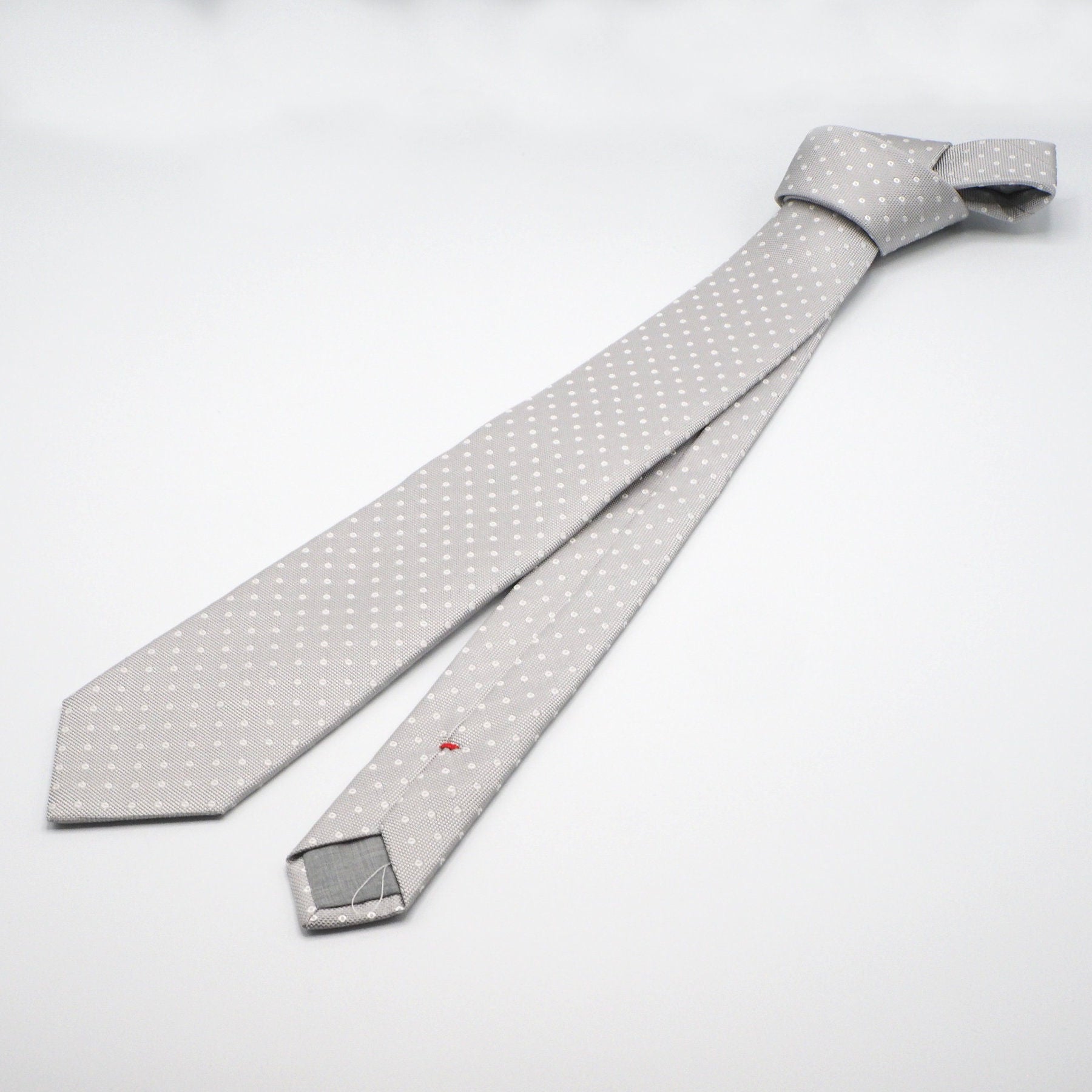 Ice grey tie with white polka dots