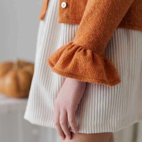 CARDIGAN SWEATER WITH POM POM