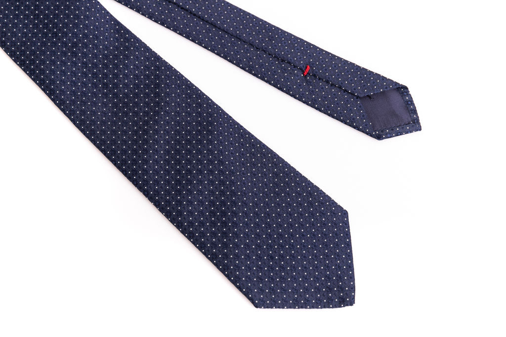 Navy blue tie with micro polka dots in pure silk