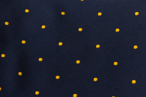 Blue tie with yellow polka dots in pure silk