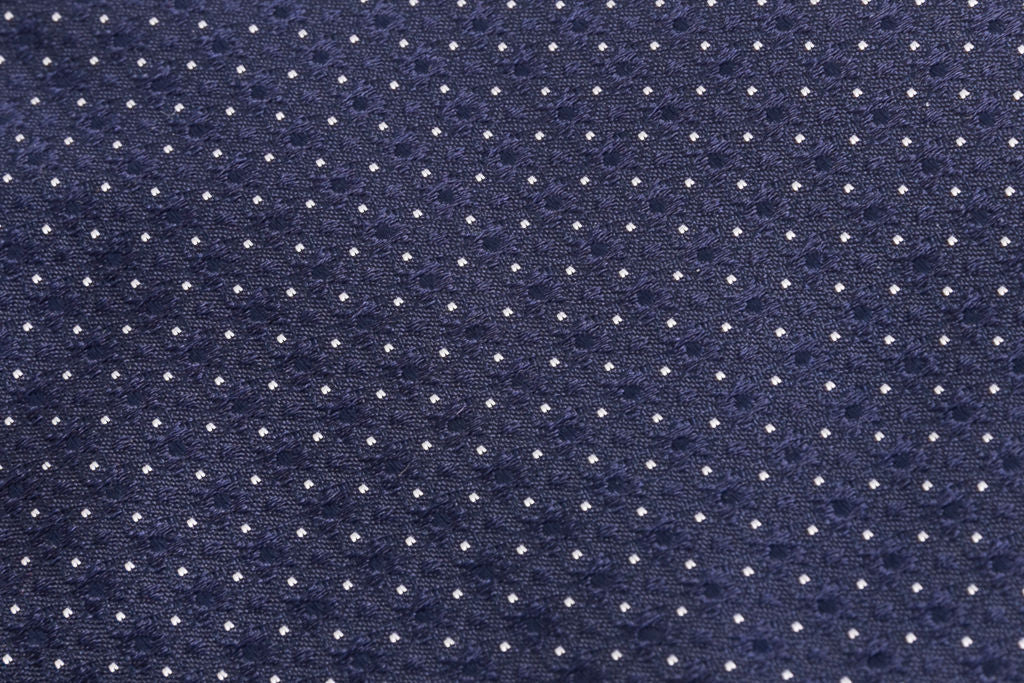 Navy blue tie with micro polka dots in pure silk