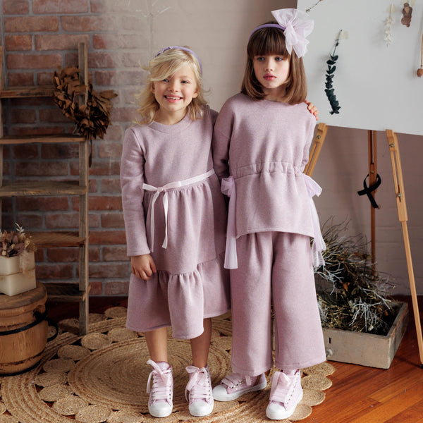 MAGLIA FELPA LUREX CON FIOCCHI IN VITA