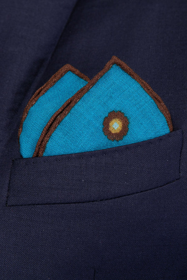 Turquoise clutch bag in pure wool