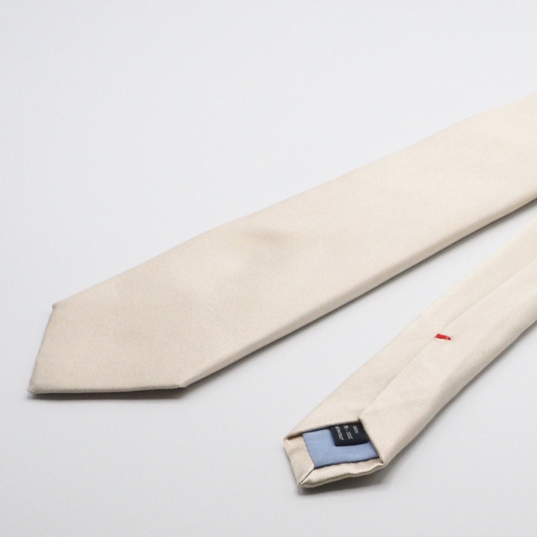 Cream colored pure silk tie