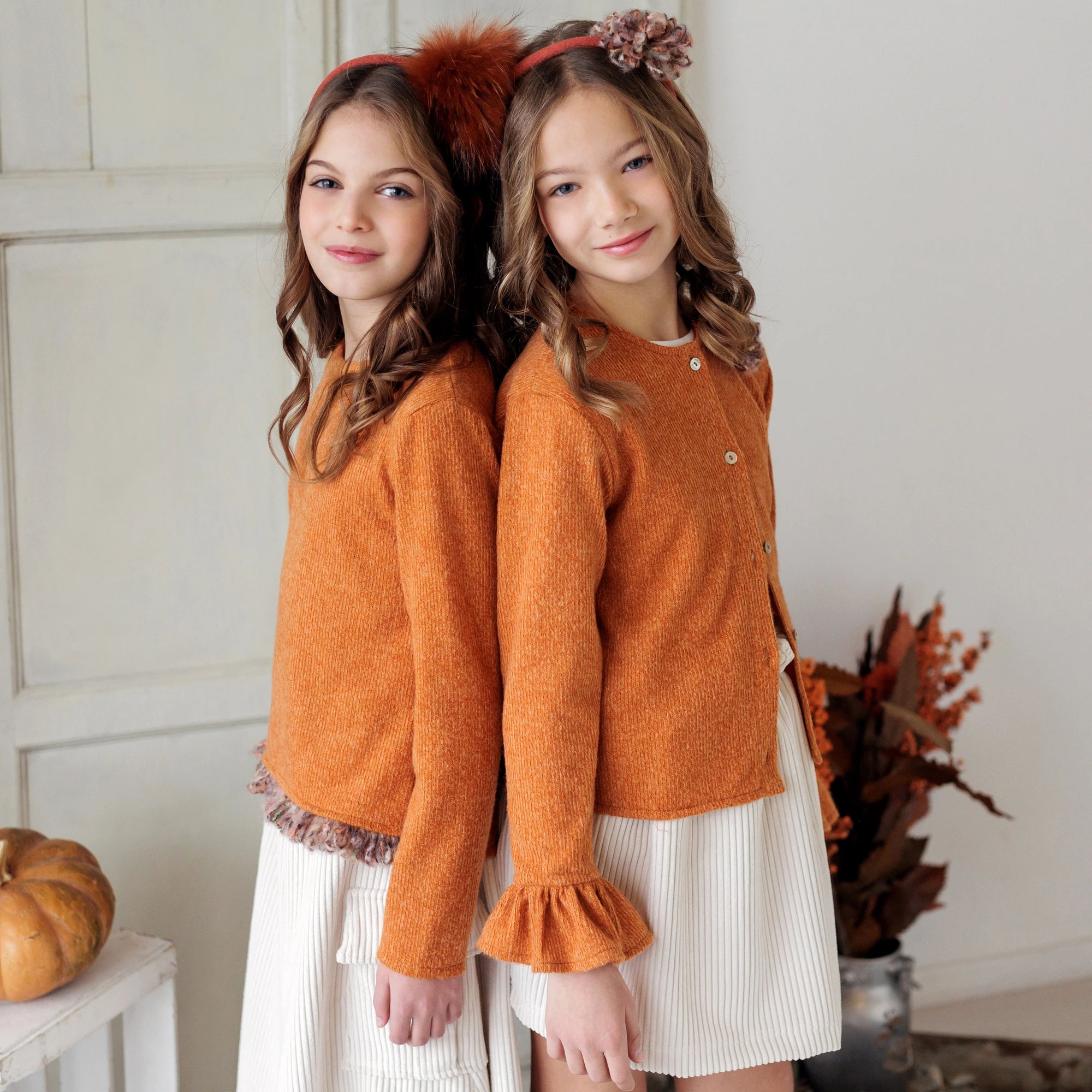 CARDIGAN SWEATER WITH POM POM