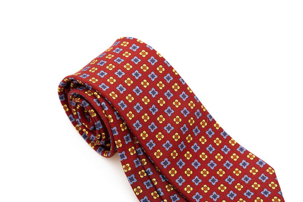 Red base tie with geometric pattern pure wool