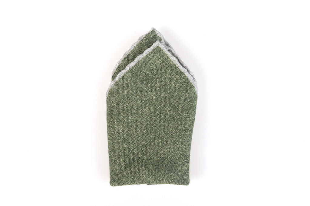 Green clutch bag with pure wool trim