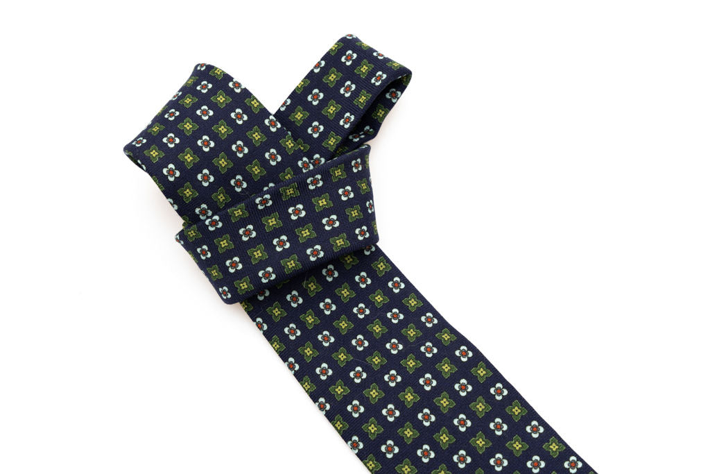 Blue base tie with geometric pattern pure wool