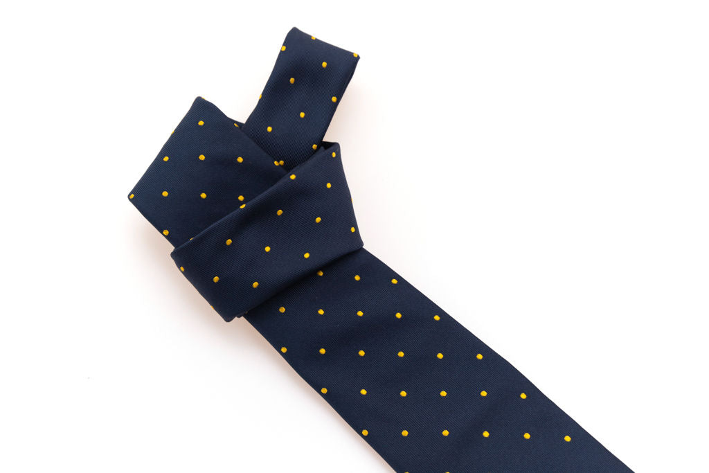Blue tie with yellow polka dots in pure silk