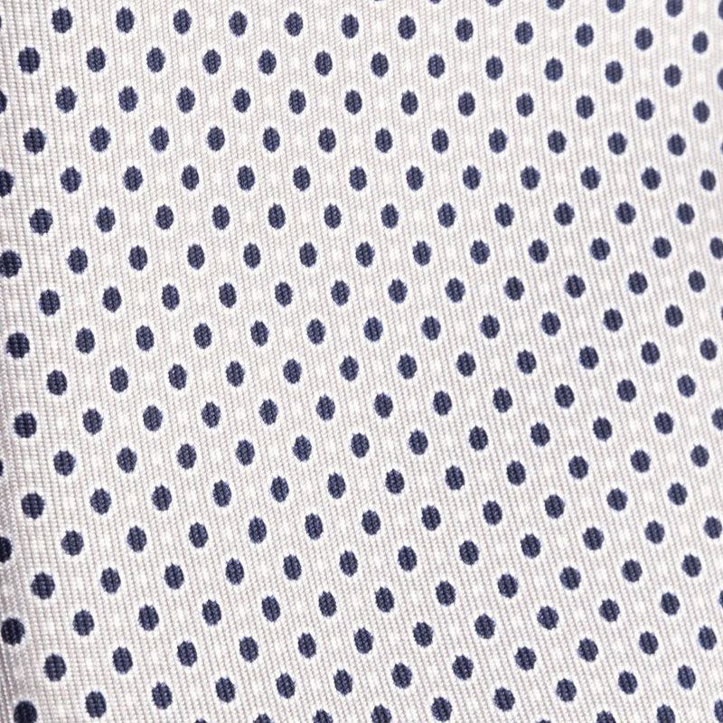 Ice grey tie with blue and white polka dots