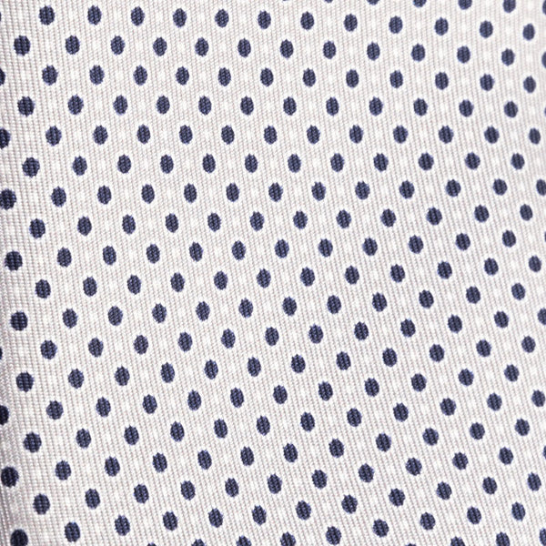 Ice grey tie with blue and white polka dots
