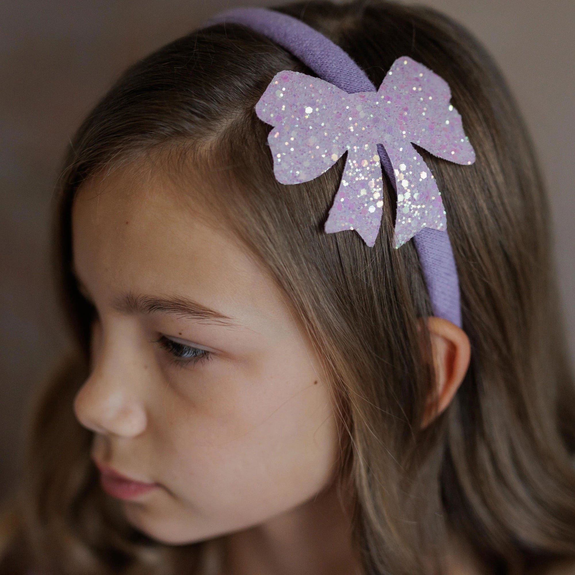 CERCHIETTO CON FIOCCO GLITTER