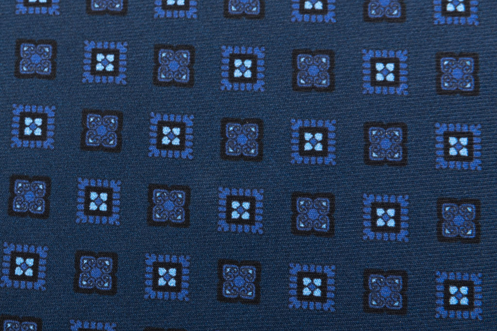 Blue tie with light blue geometric pattern pure silk