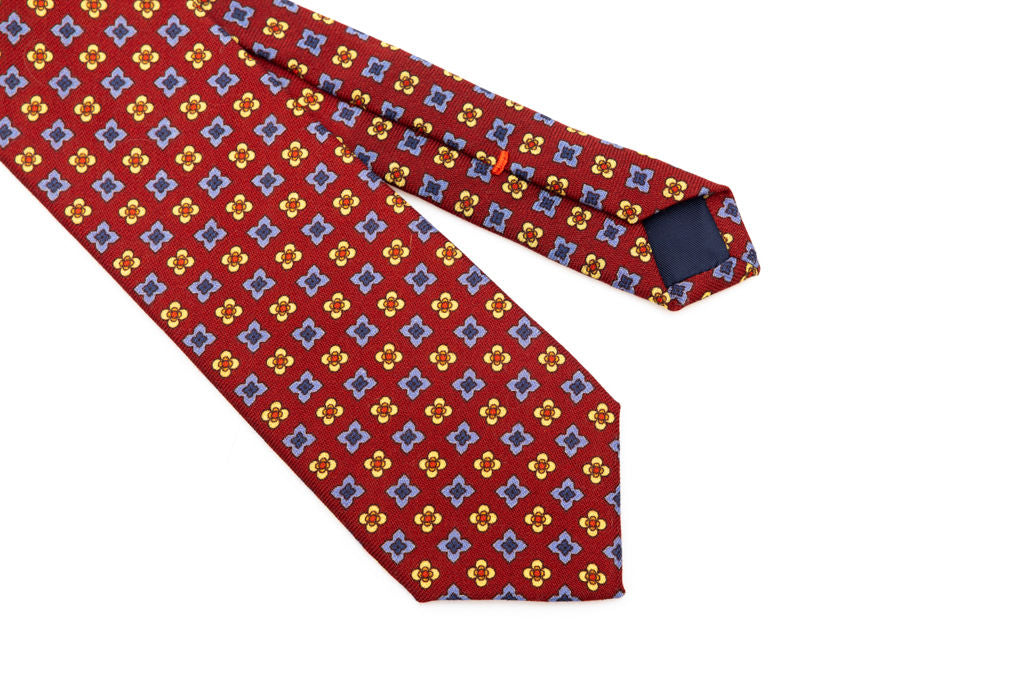 Red base tie with geometric pattern pure wool