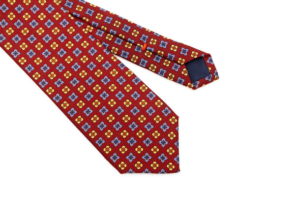 Red base tie with geometric pattern pure wool