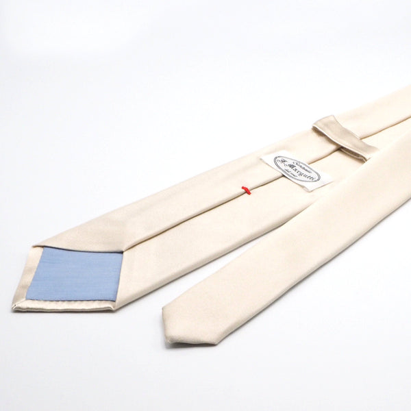Cream colored pure silk tie