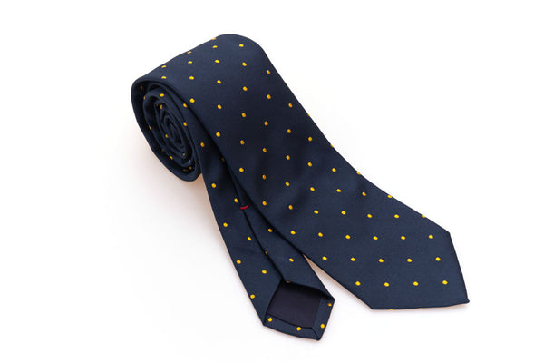 Blue tie with yellow polka dots in pure silk
