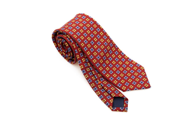 Red base tie with geometric pattern pure wool