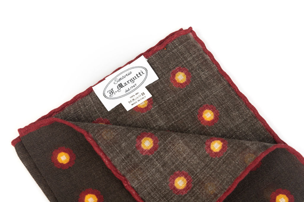 Brown clutch bag in pure wool pattern