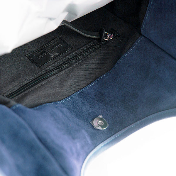CLEA - Suede and leather bag in aviation