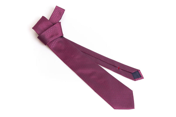Dark pink tie with micro polka dots in pure silk
