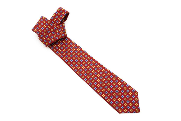 Red base tie with geometric pattern pure wool