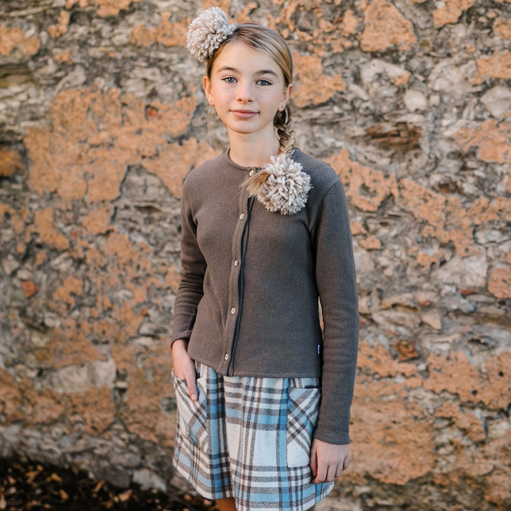 CARDIGAN CON SPILLA POMPON