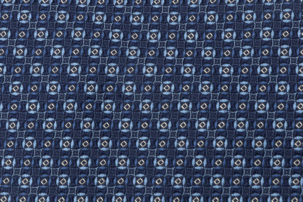 Micro-patterned blue tie in pure silk