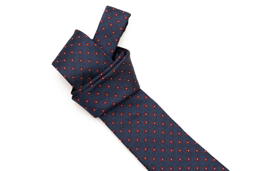 Blue base tie with floral geometry pure silk