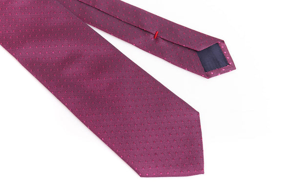 Dark pink tie with micro polka dots in pure silk