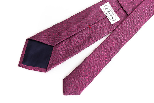 Dark pink tie with micro polka dots in pure silk