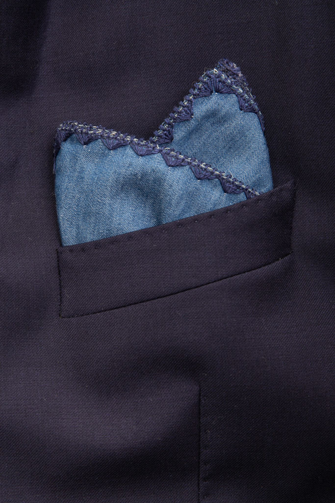 Pochette blu denim in cotone con bordo