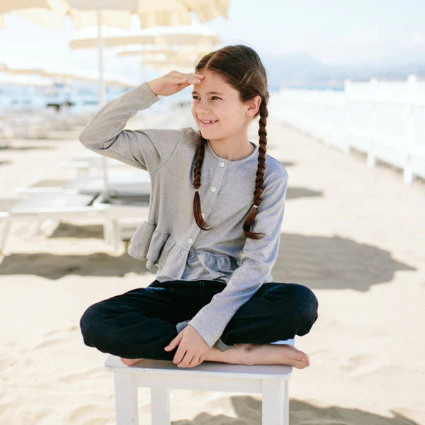 CARDIGAN CON BALZA