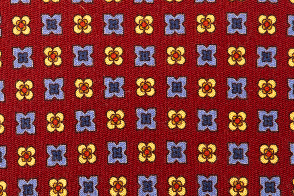 Red base tie with geometric pattern pure wool