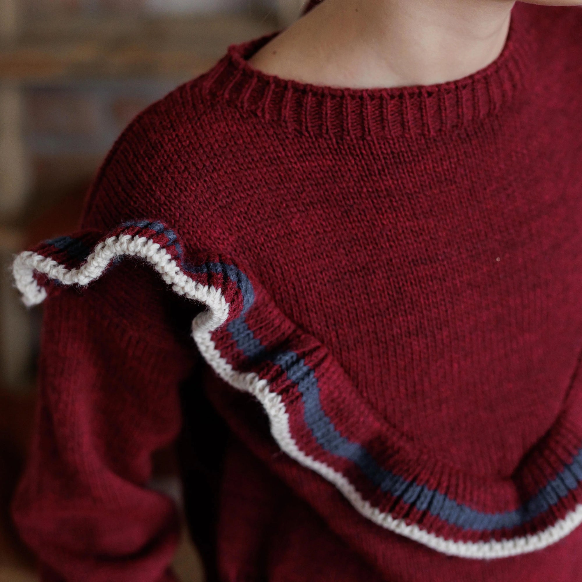 PULLOVER CON FRAPPE