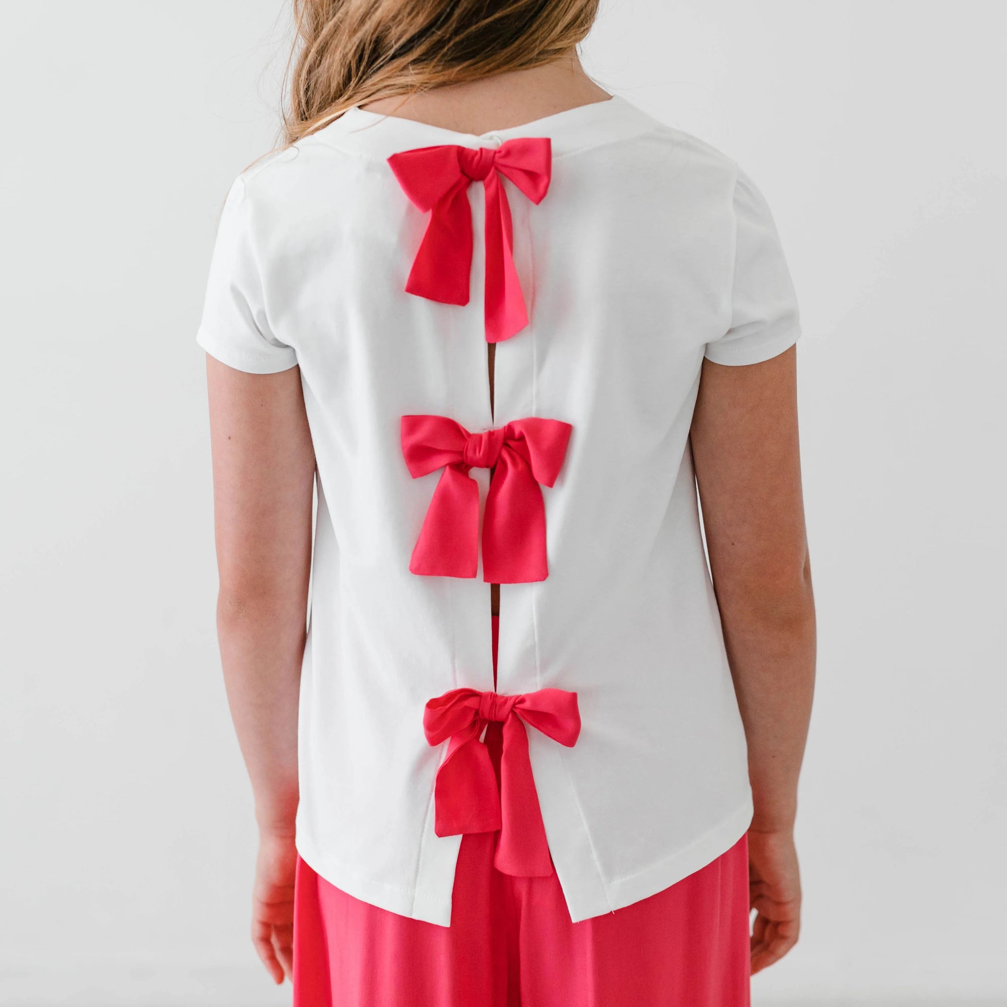 T-SHIRT CON FIOCCHI IN VISCOSA
