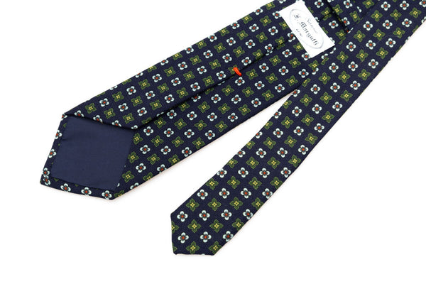 Blue base tie with geometric pattern pure wool