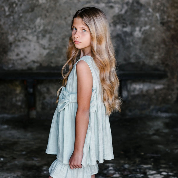 TOP VERDE MENTA CON FIOCCO FRONTALE