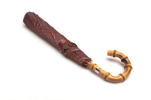 Mario Talarico red folding umbrella with bamboo handle pattern