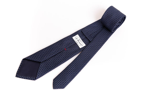 Navy blue tie with micro polka dots in pure silk